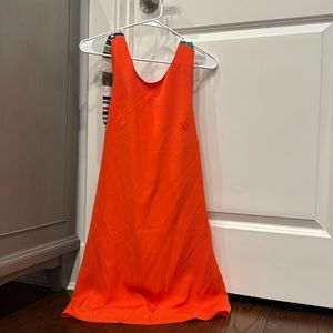 Lulu’s. Orange dress with colorful tie in back. NWT.